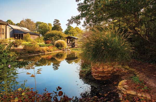 Garden Atriums includes a shared space that features an aquaculture pond.